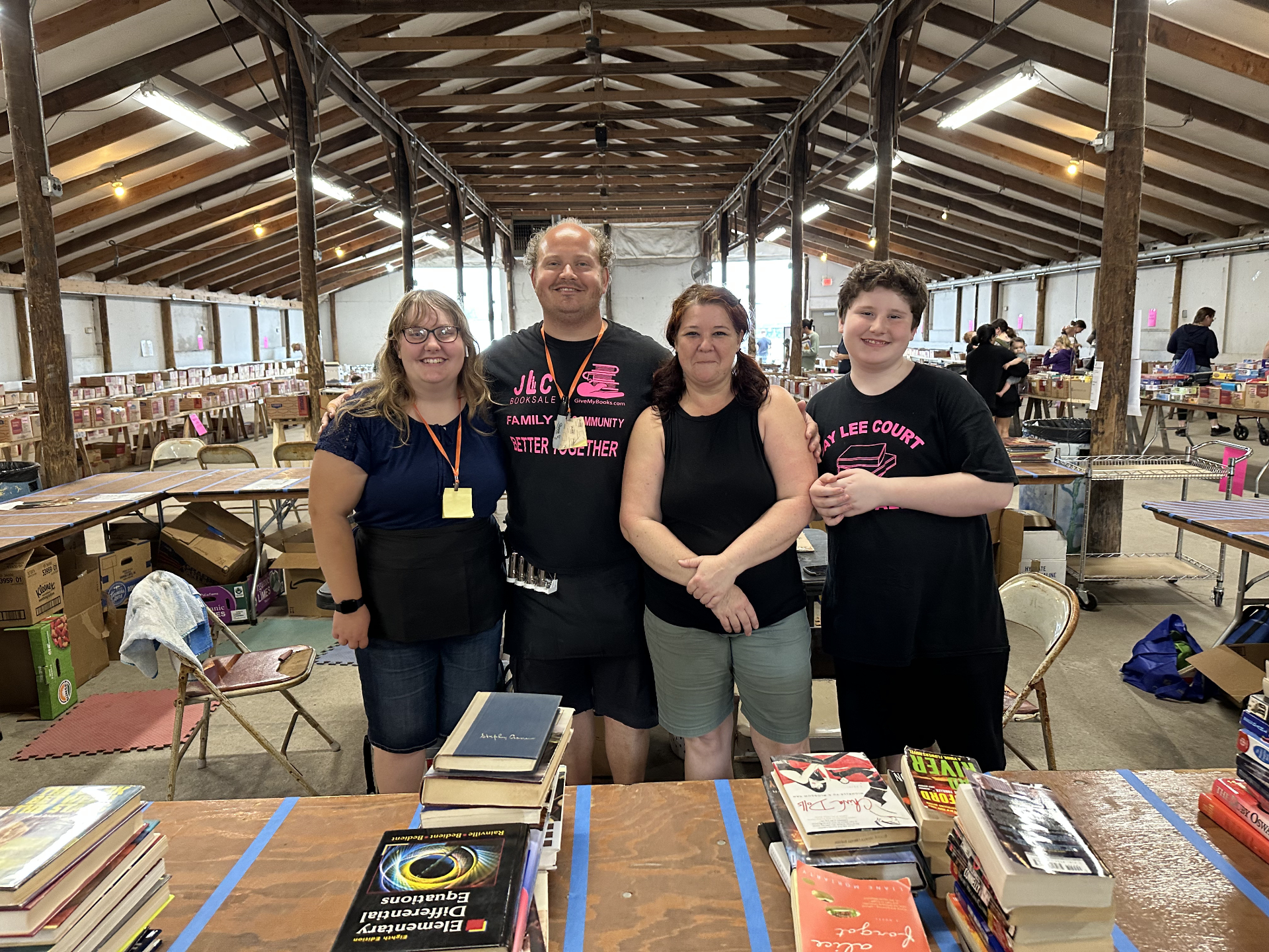 The Whalen family running a book sale, circa 2019